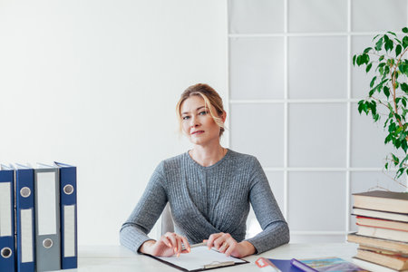 business woman at a desk in the office officeの写真素材
