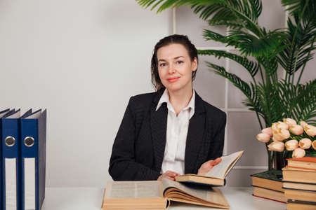 beautiful woman in a business desk at work in an officeの写真素材