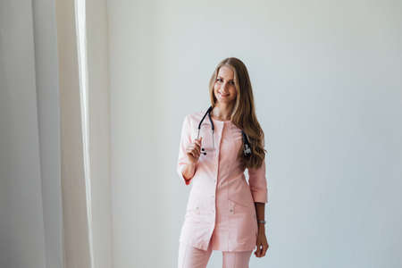 beautiful woman doctor with stethoscope therapist in hospitalの写真素材