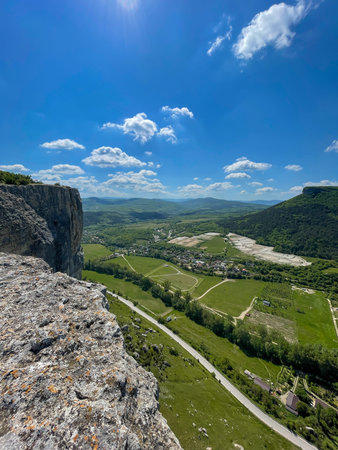 a high mountains nature blue sky view from above hiking journeyの写真素材