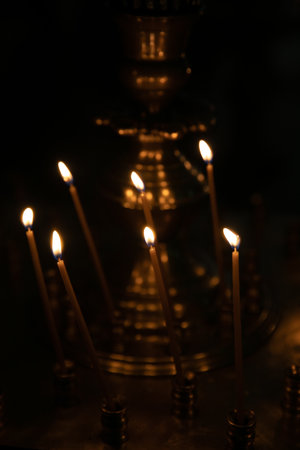 Candles on the altar in the church religionの写真素材