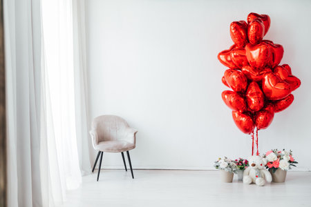 Interior in a bright room red balloons with flowersの写真素材