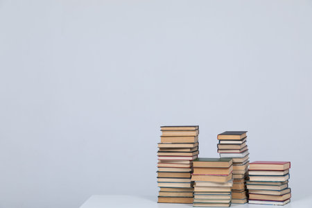 stack of books on white background learning library teaching science