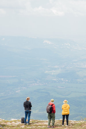 people stand on the mountain travel hiking on footの写真素材