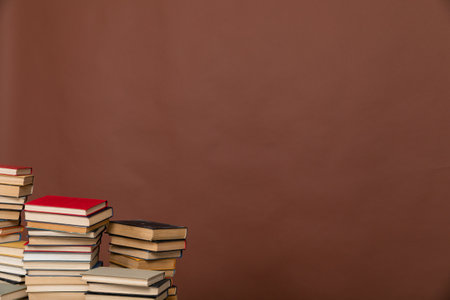 science learning library education stack of books on brown backgroundの写真素材