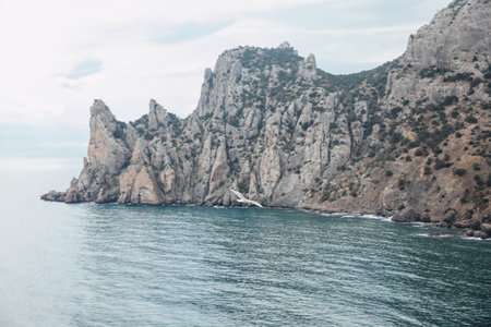 beautiful mountain cliffs and sea in a nature hike journeyの写真素材
