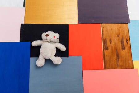 backgrounds of different color red blue brown black yellow with toyの写真素材