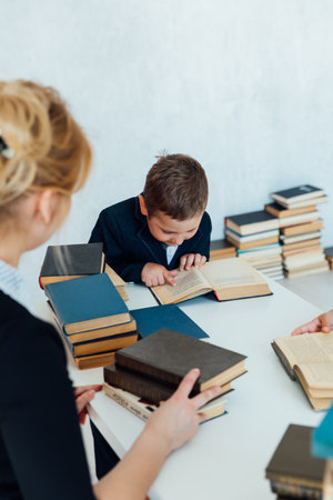 teacher teaching children boy and girl in school classroomの写真素材