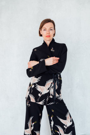 Portrait of beautiful fashionable slender brunette woman 40 years oldの写真素材