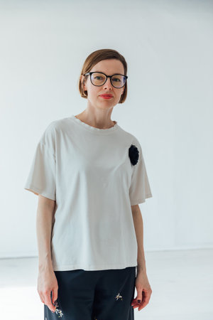 Portrait of beautiful fashionable slender brunette woman 40 years oldの写真素材