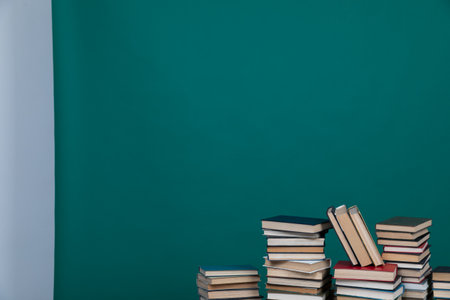 Lots of stacks of educational books to read as a backgroundの写真素材