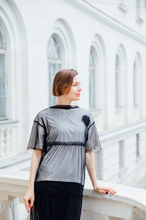 Portrait of beautiful slender fashionable brunette womanの写真素材