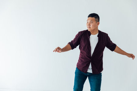 Male coach dancing in bright studioの写真素材