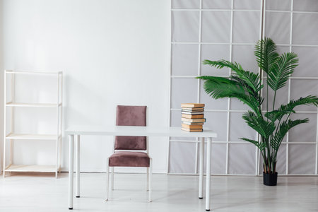 Desk for working in the interior of a white officeの写真素材