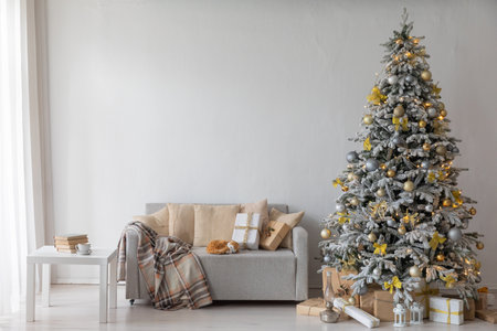 christmas tree with gifts in interior without people new yearの写真素材