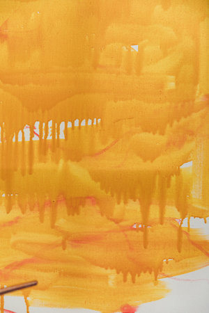 orange painted canvas texture structure as backgroundの写真素材
