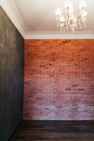 Empty room with dark and brick wall interiorの写真素材
