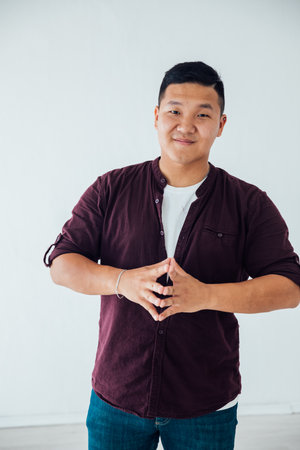 Man posing on white background in studioの写真素材