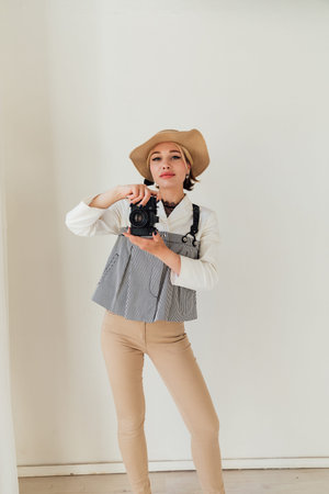 Beautiful woman photographer with camera