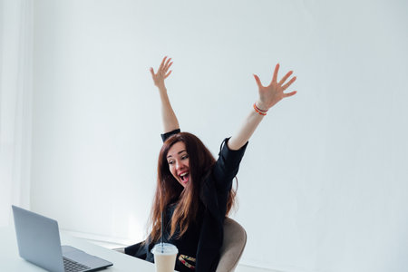 Business Woman Very Happy Online Laptop Winの写真素材
