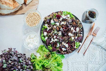 Delicious food: beetroot, cheese and herbs salad with bread