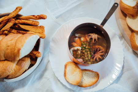 Delicious food seafood soup cooked in the kitchen as backgroundの写真素材