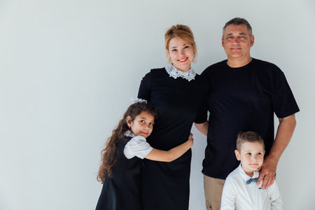 Family photo of parents with children boy and girlの写真素材