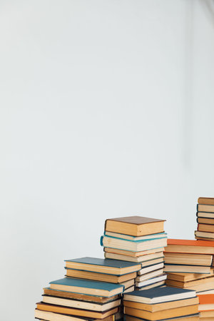 Stacks of old books in study library on white background