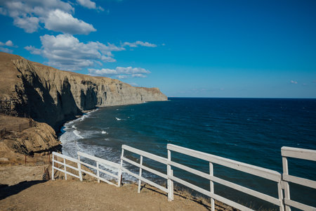 scenery on top of the mountain, rocks, sea and blue skyの写真素材