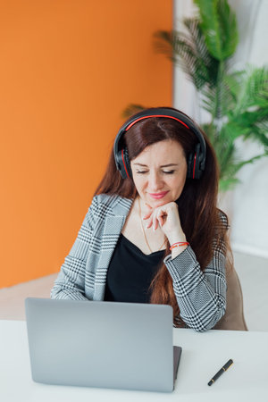woman conducts broadcast on the Internet laptop smartphone