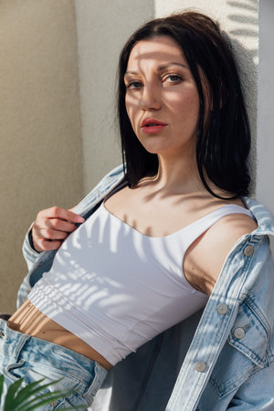 fashion brunette woman in denim suit