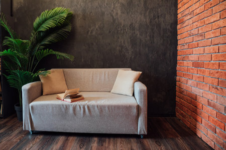Office Sofa With Book By Gray Brick Loft Wallの写真素材