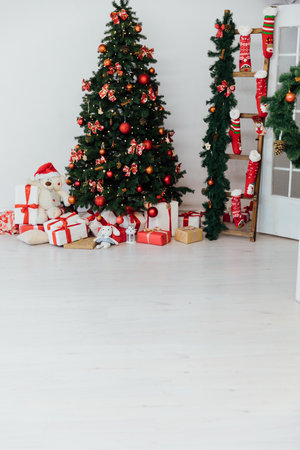 Christmas Tree with Gifts and Toys Decorated for New Yearの写真素材