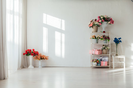 Baskets with different colors in the interior of a room with a windowの写真素材