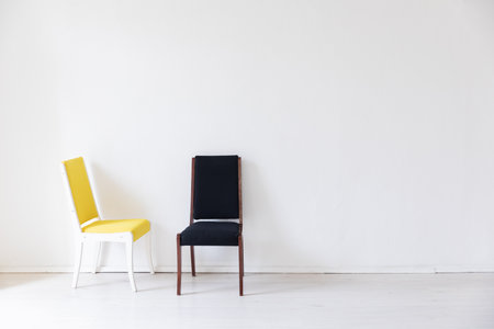 Two vintage chair in the interior of an roomの写真素材