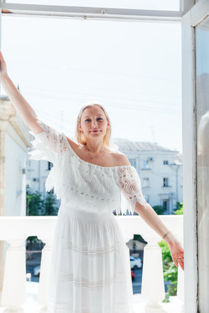 Beautiful woman in summer white wedding dressの写真素材