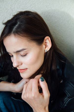 Beautiful Fashion Slim Woman Portrait Face on Light Backgroundの写真素材