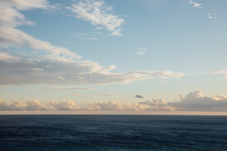 Beautiful landscape, blue sea, horizon and sky with cloudsの写真素材