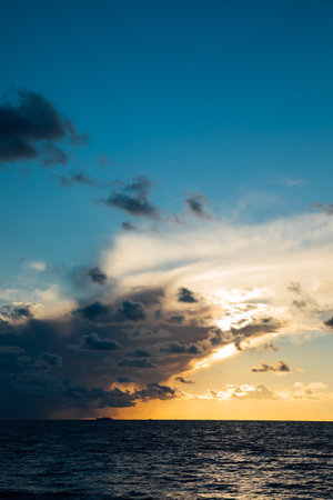 Beautiful landscape sea with waves and clouds at sunsetの写真素材