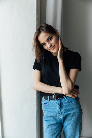 Beautiful Slim Fashion Woman Smiling on Light Background Portrait