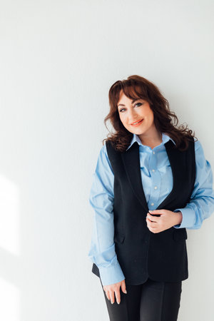 Portrait of Beautiful Business Woman Brunette on White Backgroundの写真素材
