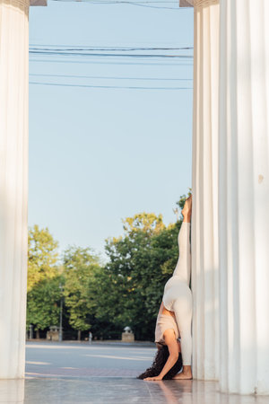 sports fitness woman brunette doing gymnastics yoga asanaの写真素材
