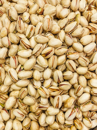 lots of nuts pistachio for cooking backgroundの写真素材