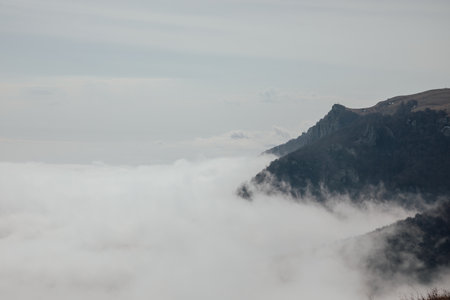 Beautiful scenery of the mountain in the cloudsの写真素材