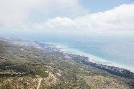 Beautiful scenery on the mountains, sea and blue sky from the top of the cliffの写真素材