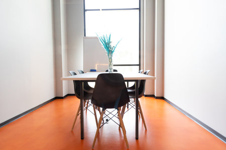 Interior of the hall with a table and a window for conferences and meetingsの写真素材