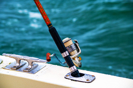 Spinning with a reel on the background of the sea
