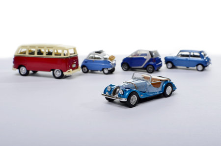 miniature car against other cars, concept