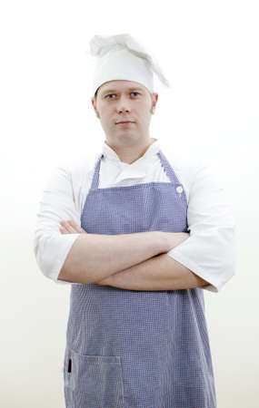 Portrait of handsome chief cook with arms crossedの写真素材