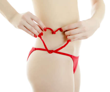 Woman body in red panties. Isolated on white.の写真素材